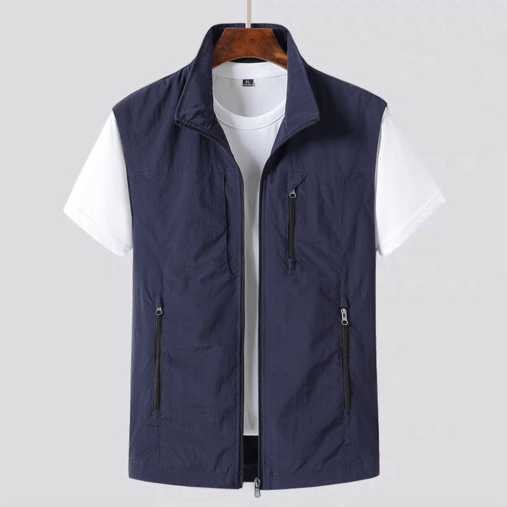 Stylish men's lightweight sleeveless vest with full zip closure, comfortable for outdoor activities & everyday wear.