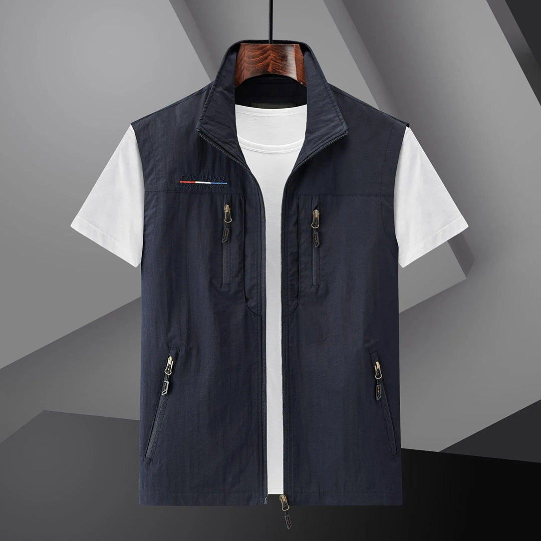 Men's lightweight utility vest for outdoor adventure, hiking, and travel, featuring multiple pockets.