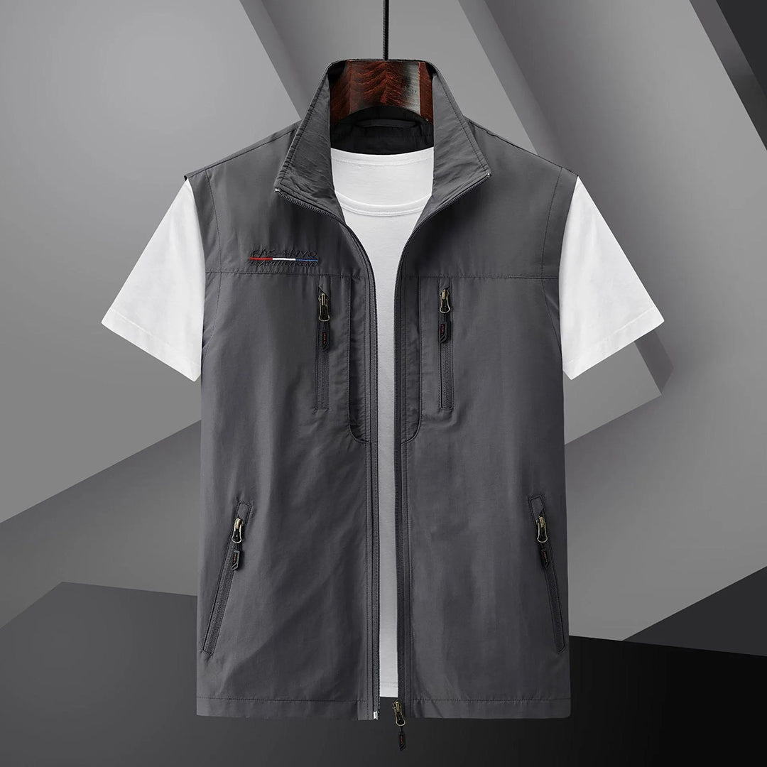 Versatile men's travel vest, a lightweight sleeveless jacket with many pockets for ultimate outdoor utility.