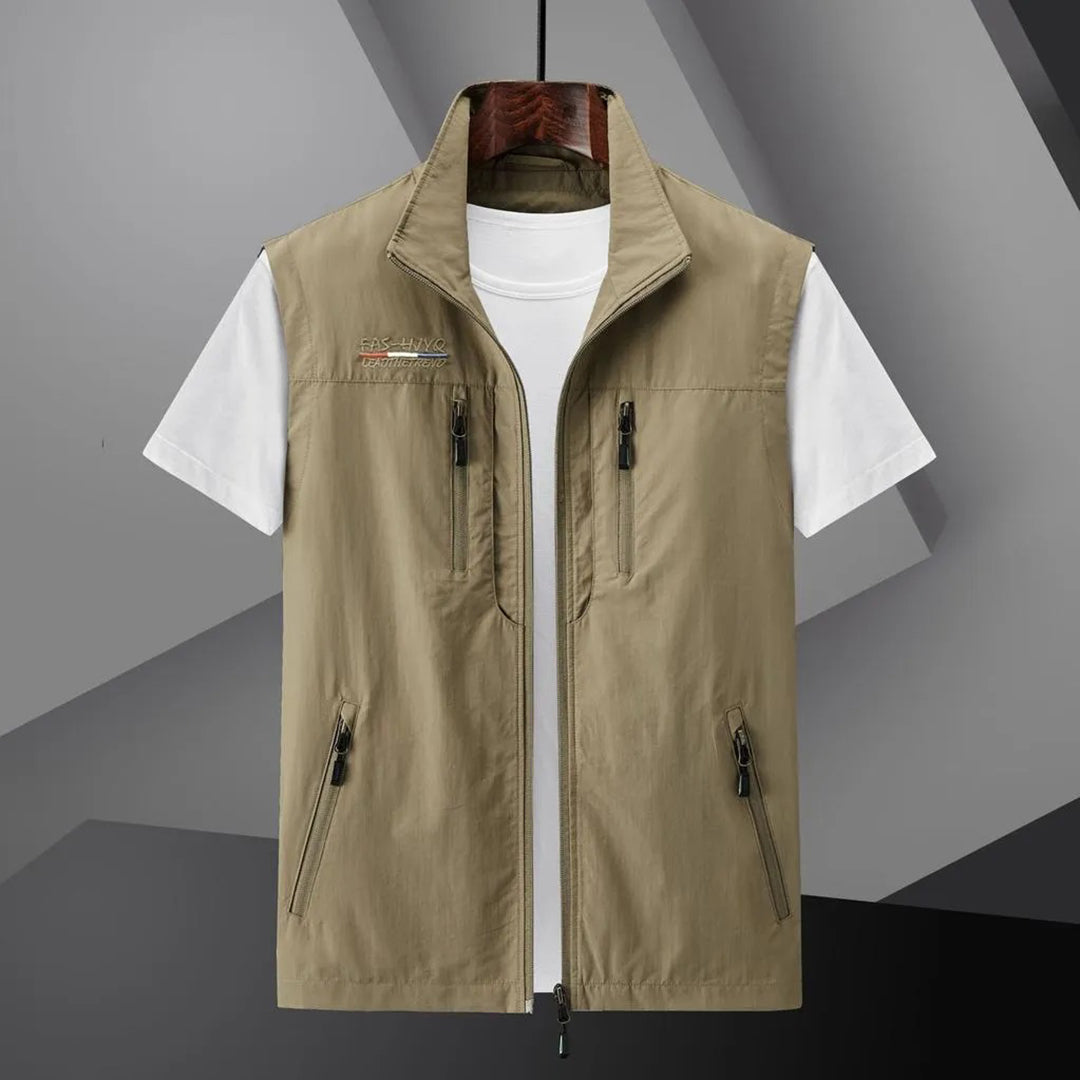Lightweight men's adventure vest, a breathable multi-pocket utility vest perfect for active outdoor pursuits.