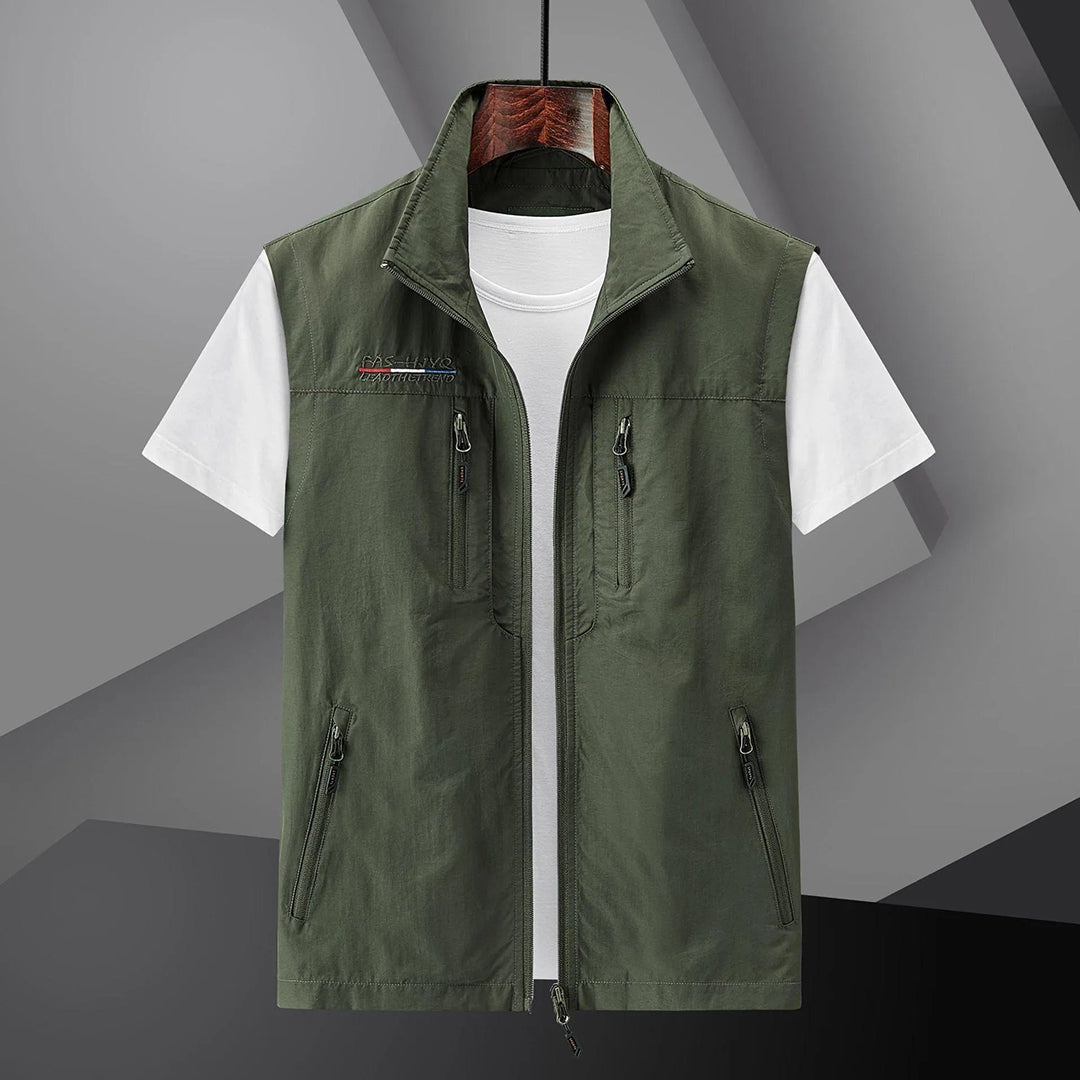 Men's outdoor utility vest for adventure. Lightweight design with multiple pockets, perfect as a hiking or fishing vest.