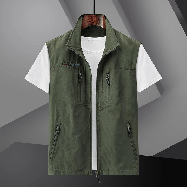 Men's outdoor utility vest for adventure. Lightweight design with multiple pockets, perfect as a hiking or fishing vest.