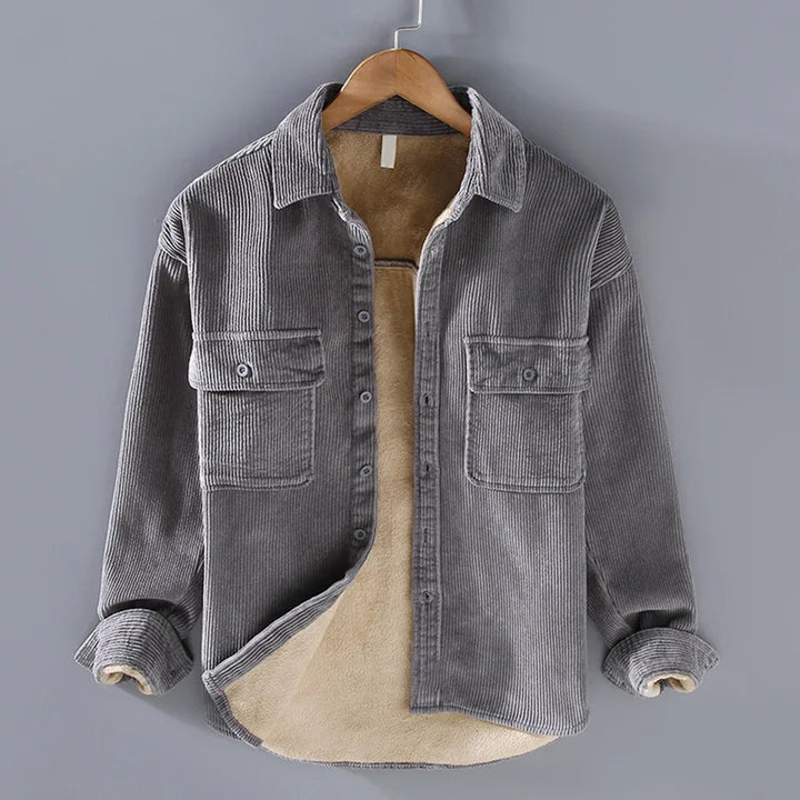 Close-up of men's textured corduroy jacket. Warm, durable, classic look, perfect for fall fashion.