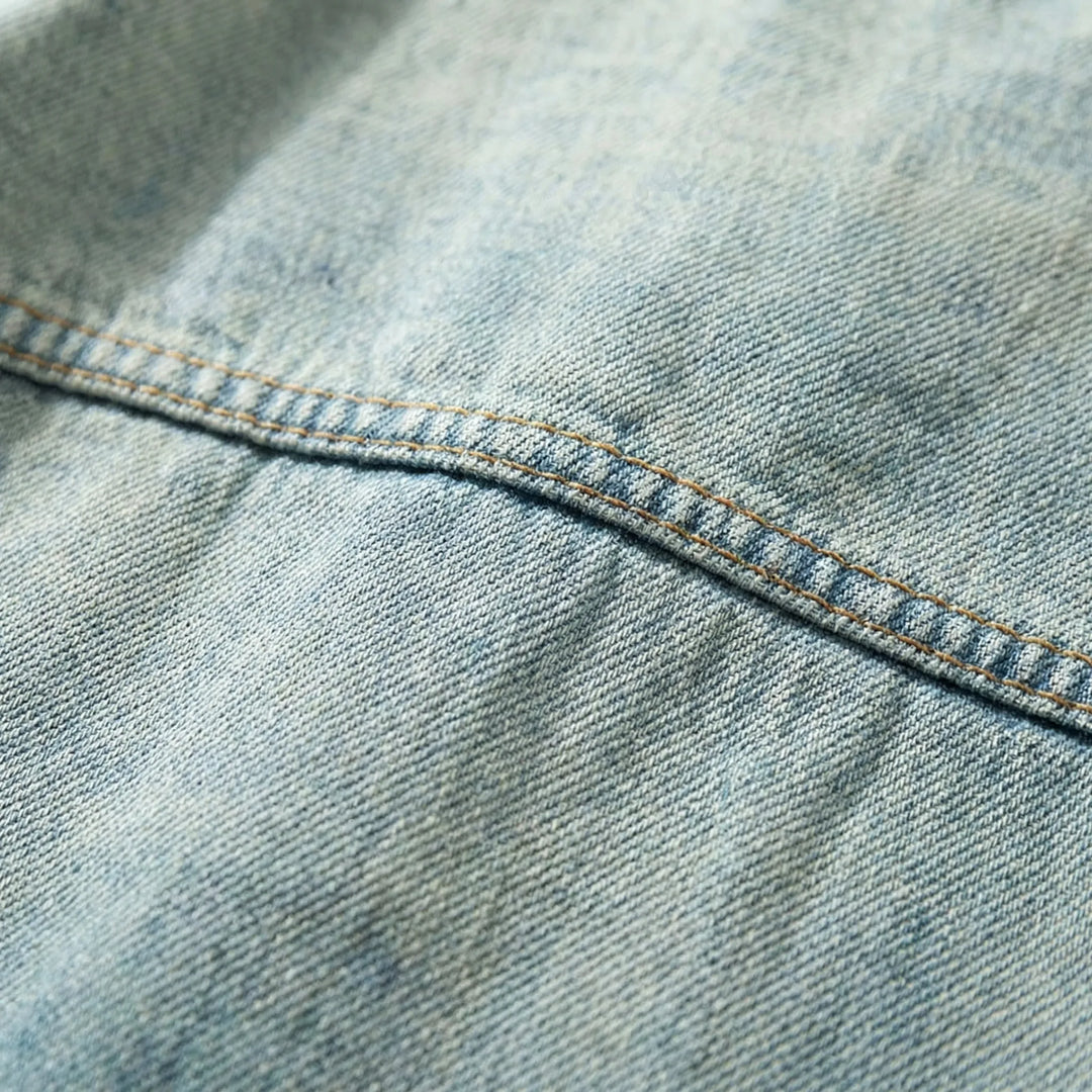 Plus size men's loose fit denim jacket, featuring a stylish zip-up design for comfortable casual wear.