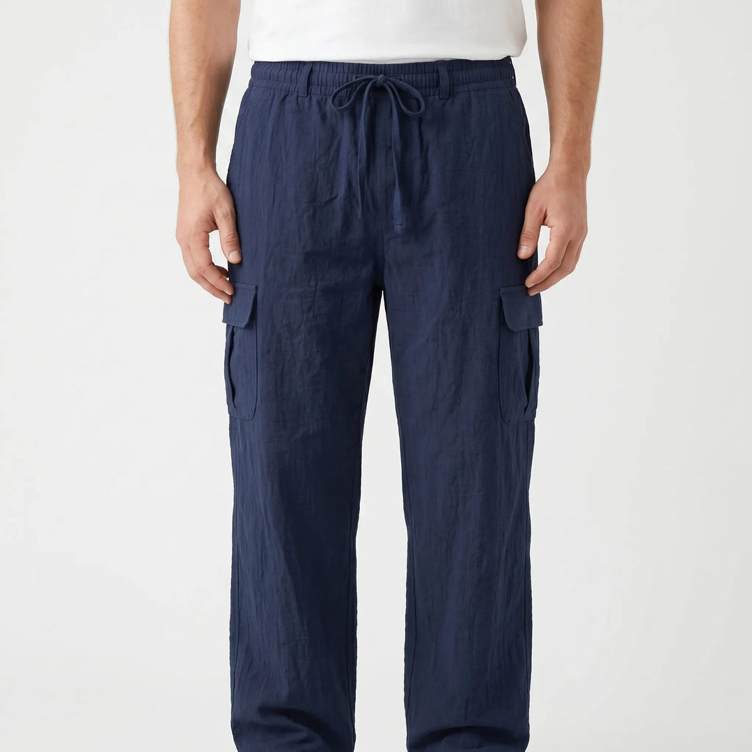 Khaki men's cargo pants with multiple utility pockets, ideal for travel and summer comfort.