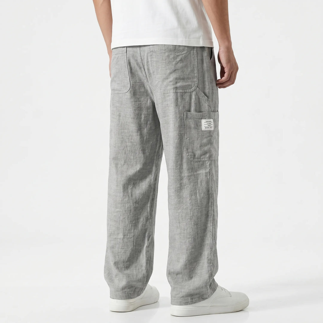 Black men's loose fit straight-leg cargo pants with an adjustable waist for ultimate comfort.