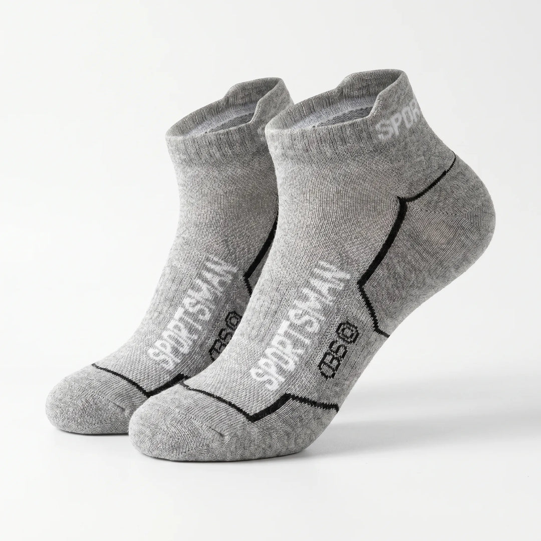 Soft, breathable men's low-cut athletic socks, cushioned for comfort during intense workouts.
