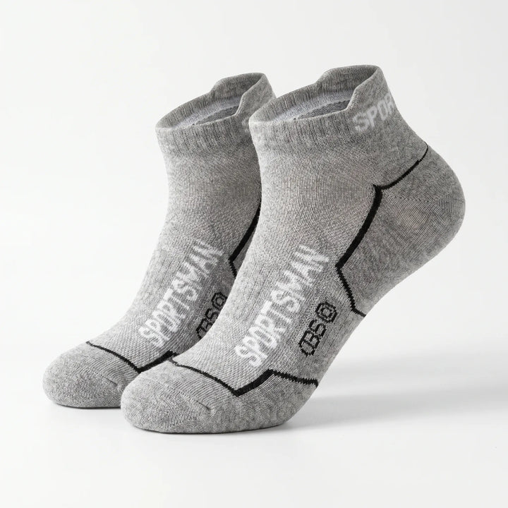 Soft, breathable men's low-cut athletic socks, cushioned for comfort during intense workouts.