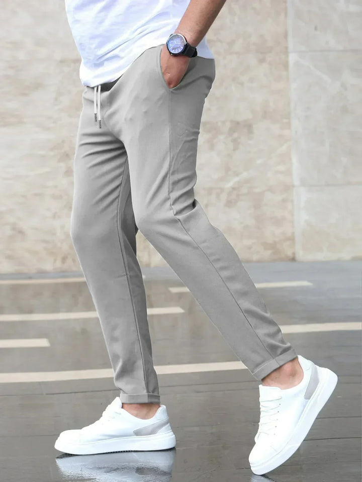 Everyday men's stretch pants with a drawstring waist, perfect for relaxed luxury.