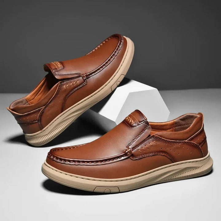 Versatile men's Madison leather slip-on loafers. Perfect blend of dress shoe appeal & casual comfort.