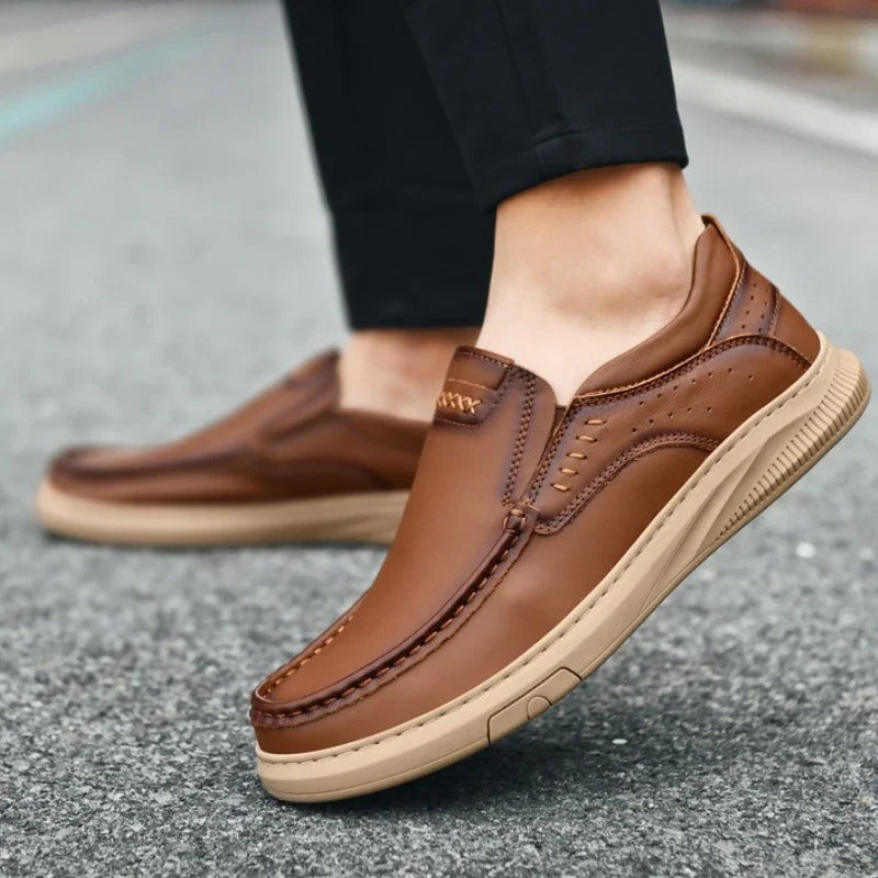 Easy-wear men's leather slip-on loafers. Madison brand comfortable footwear for everyday fashion.