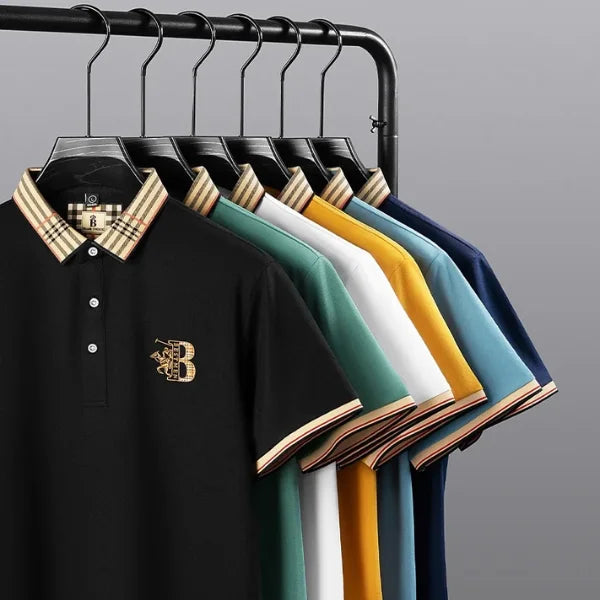 Close-up of embroidered detail on chest of Men's Matthew short-sleeve polo, perfect for versatile casual wear.