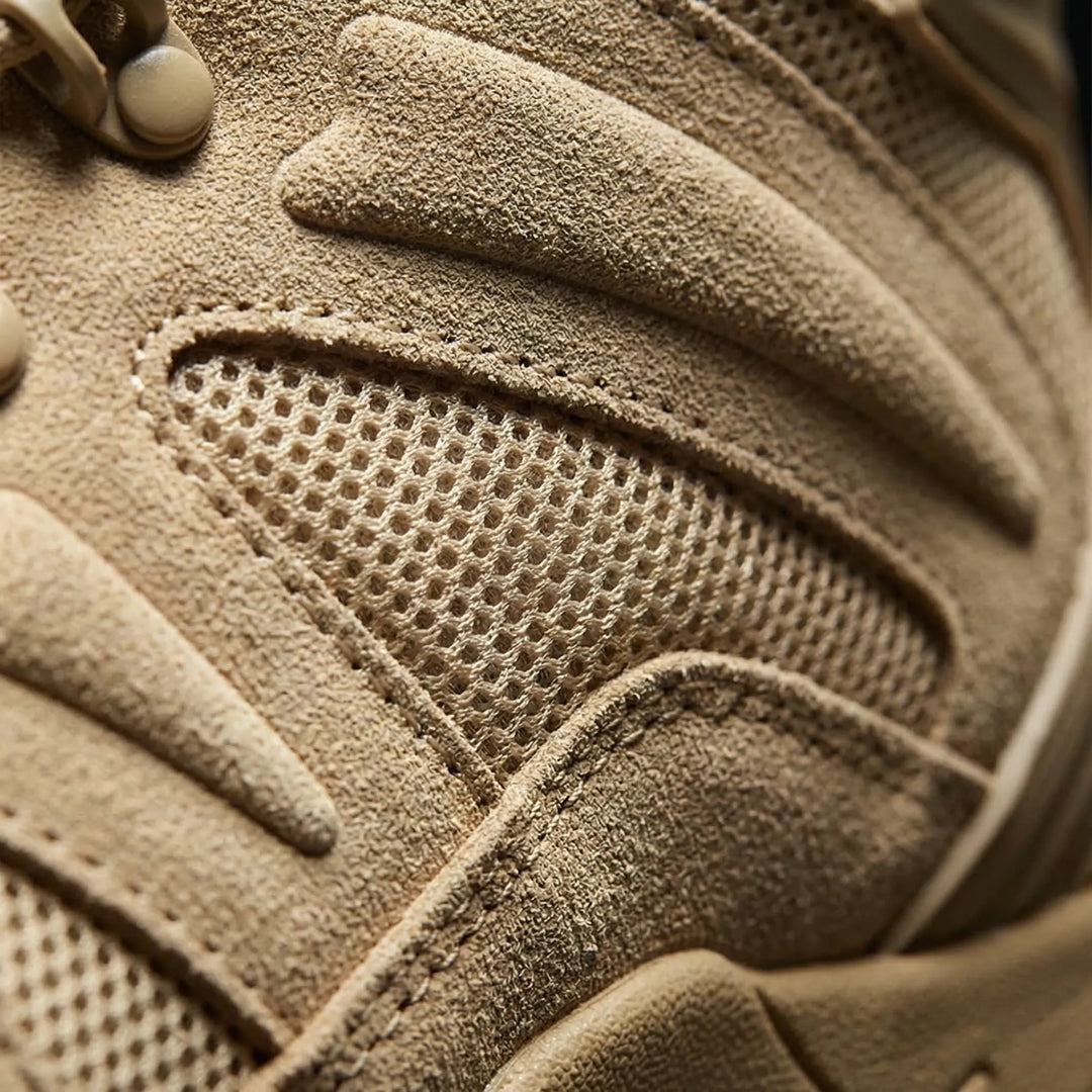 Men's mid-cut hiking boots for trails, tactical design, providing support & grip for outdoor footwear.