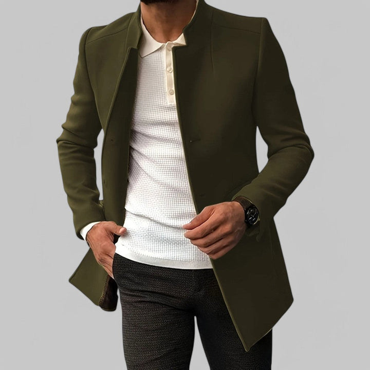 Long sleeve and cuff detail on a men's minimalist button winter coat. Smart casual tailored outerwear.