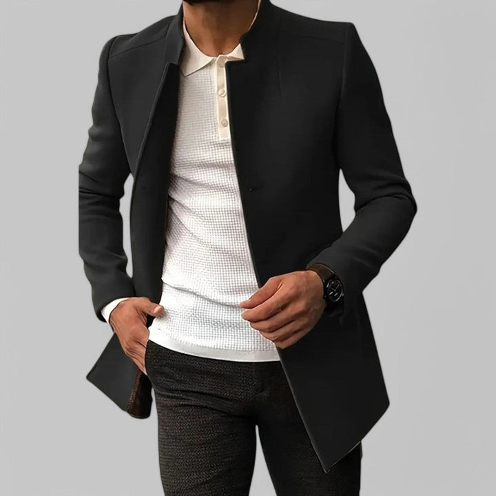 Men's minimalist winter trench coat on hanger. Perfect smart casual or business fashion tailored outerwear.