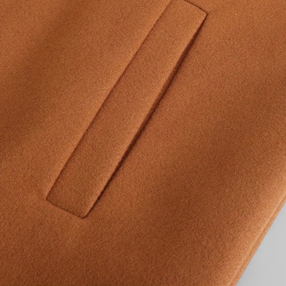Men's tailored long sleeve winter coat, minimalist style, side view. Smart casual outerwear for business fashion.