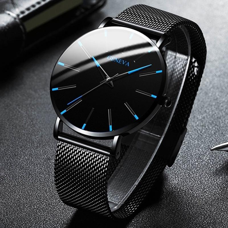 Elegant men's watch: a minimalist design, striking blue accents, and a classic black leather strap.