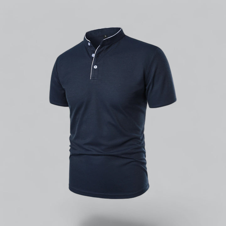 Close-up of men's mandarin collar polo top, button-up detail, modern casual style, black fabric.