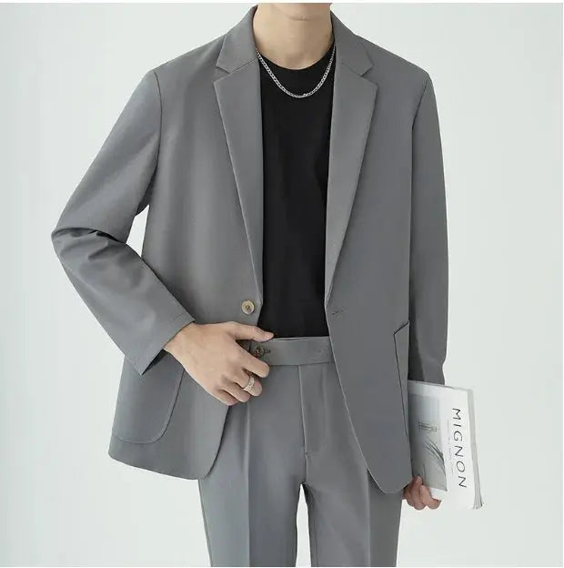 Elegant men's two-piece business suit, perfect formal wear for office attire & events.