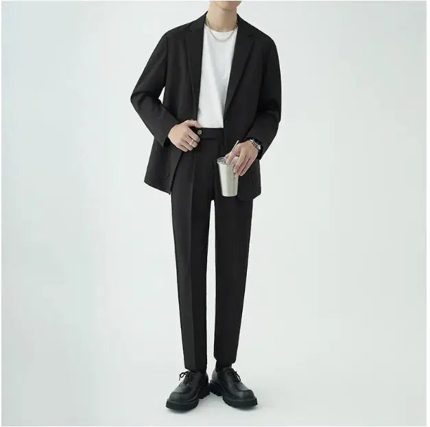Men's formal two-piece suit, ideal for special events & office attire, highlighting modern elegance.