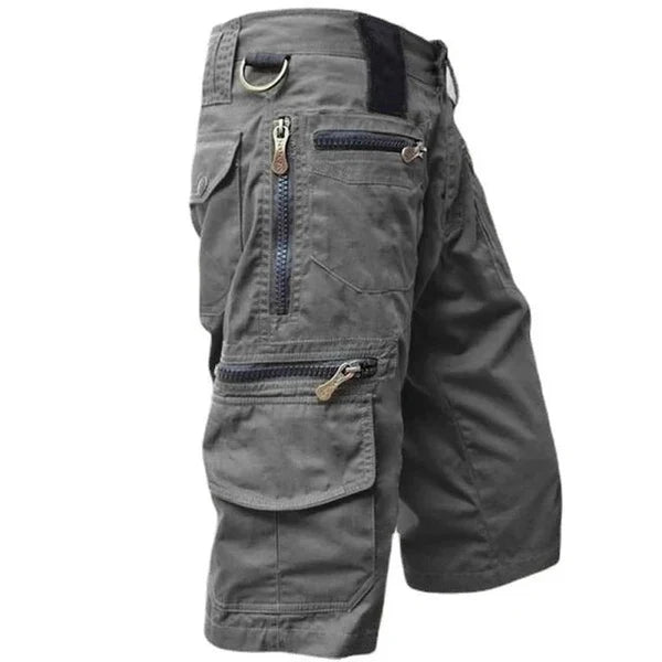 Men's multi-pocket outdoor cargo shorts for summer adventures. Durable, comfortable utility shorts with ample storage.