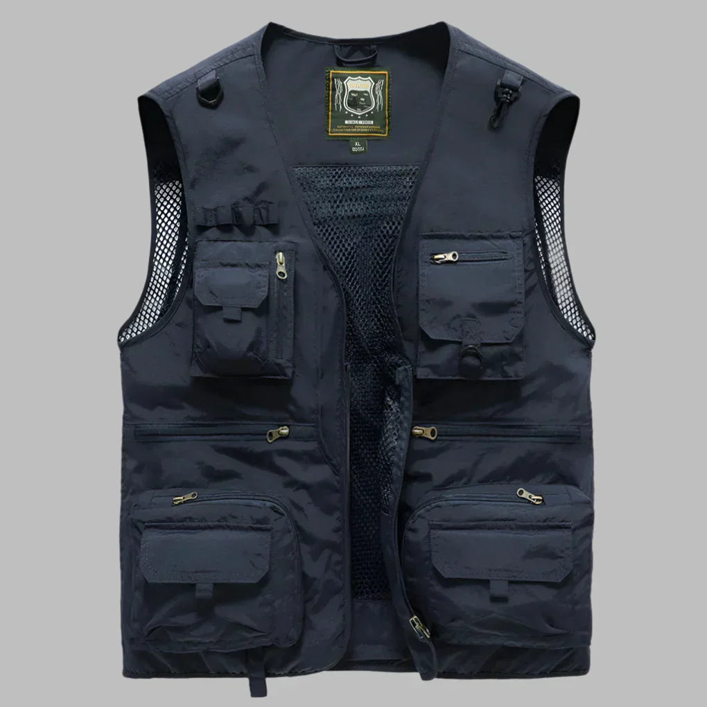 Men's rugged multi-pocket utility vest. Ideal cargo vest for outdoor activities, fishing, hiking, and travel adventures.