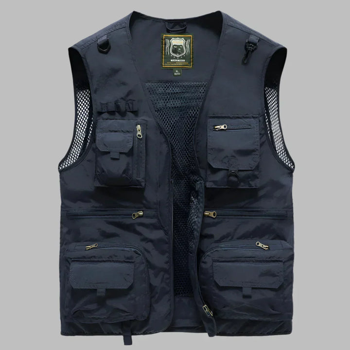 Men's rugged multi-pocket utility vest. Ideal cargo vest for outdoor activities, fishing, hiking, and travel adventures.