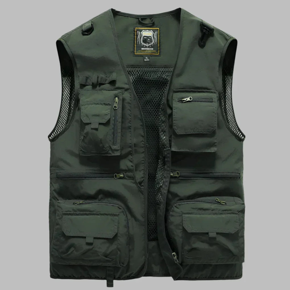 Functional men's sleeveless vest with numerous pockets, great for photography, work, or carrying essentials outdoors.
