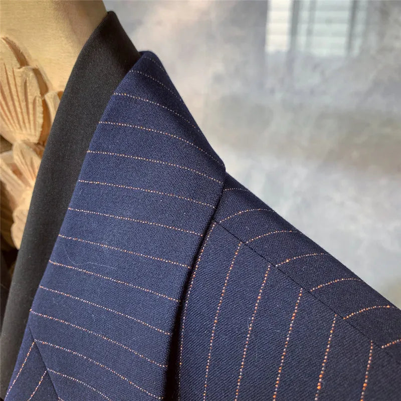 Classic men's navy pinstripe suit. Versatile formal wear for business, special occasions, and evening events.
