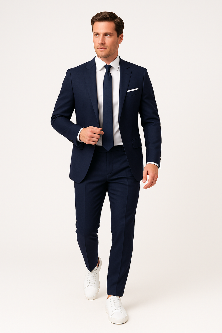 Tailored navy blue slim fit men's suit featuring a sophisticated blazer and matching trousers for formal occasions.