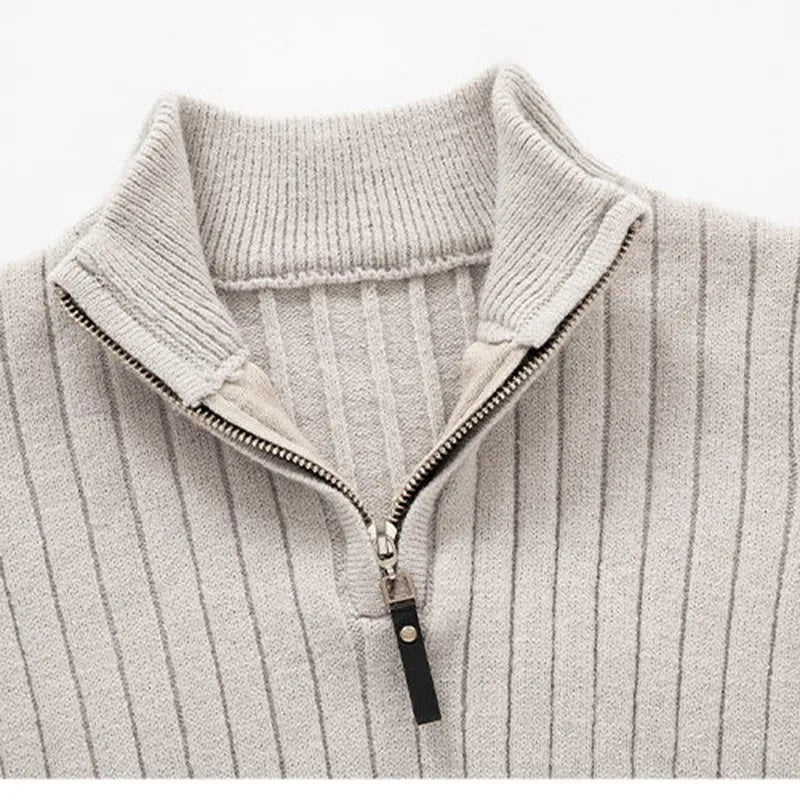 Sophisticated men's ribbed half-zip sweater in neutral tones. Modern fit layering piece for comfort.