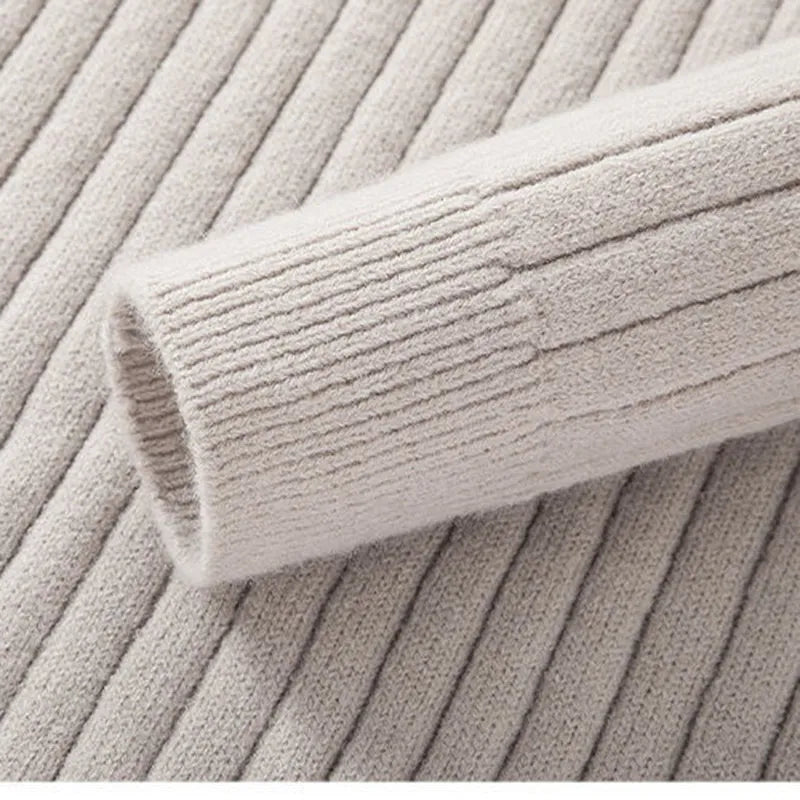 Versatile men's half-zip ribbed knitwear in a neutral tone. Perfect for layering and sophisticated fashion.