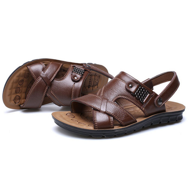 Men's walking sandals in an outdoor setting, emphasizing durability & arch support for summer adventures.