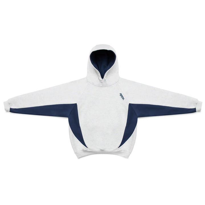 Urban lifestyle: Men's oversized pullover hoodie with sporty contrast panels. Trendy men's casual streetwear.