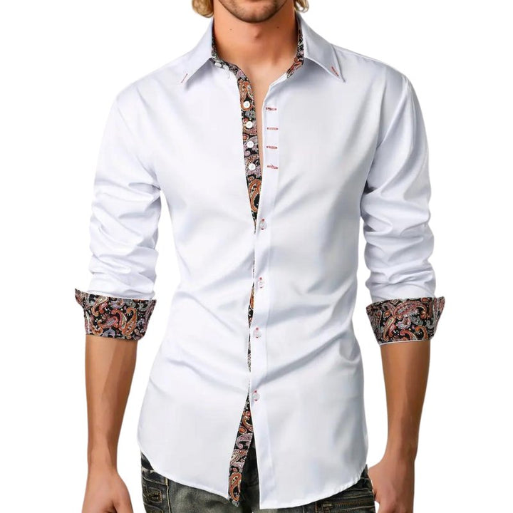 Man wearing a sophisticated men's paisley slim fit long sleeve shirt, ideal for fashion-forward looks.