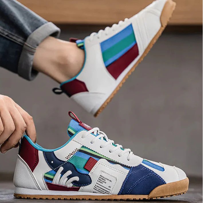 Durable men's utility trail sneakers with distinct patchwork, blending outdoor performance & street style.