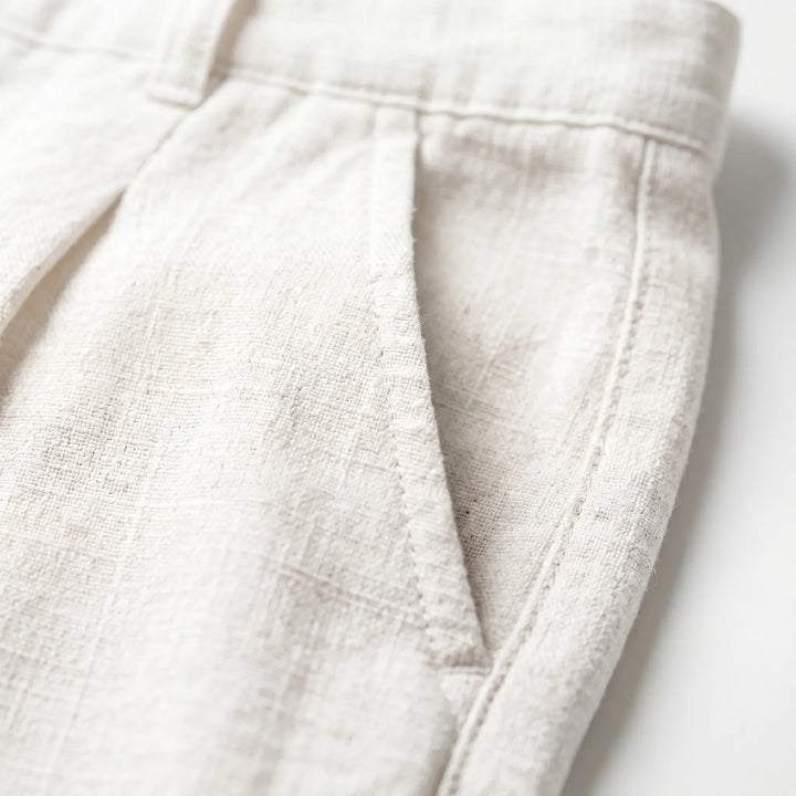 Stylish men's ankle length pleated pants. Comfortable, modern, and ideal for summer smart casual wear.