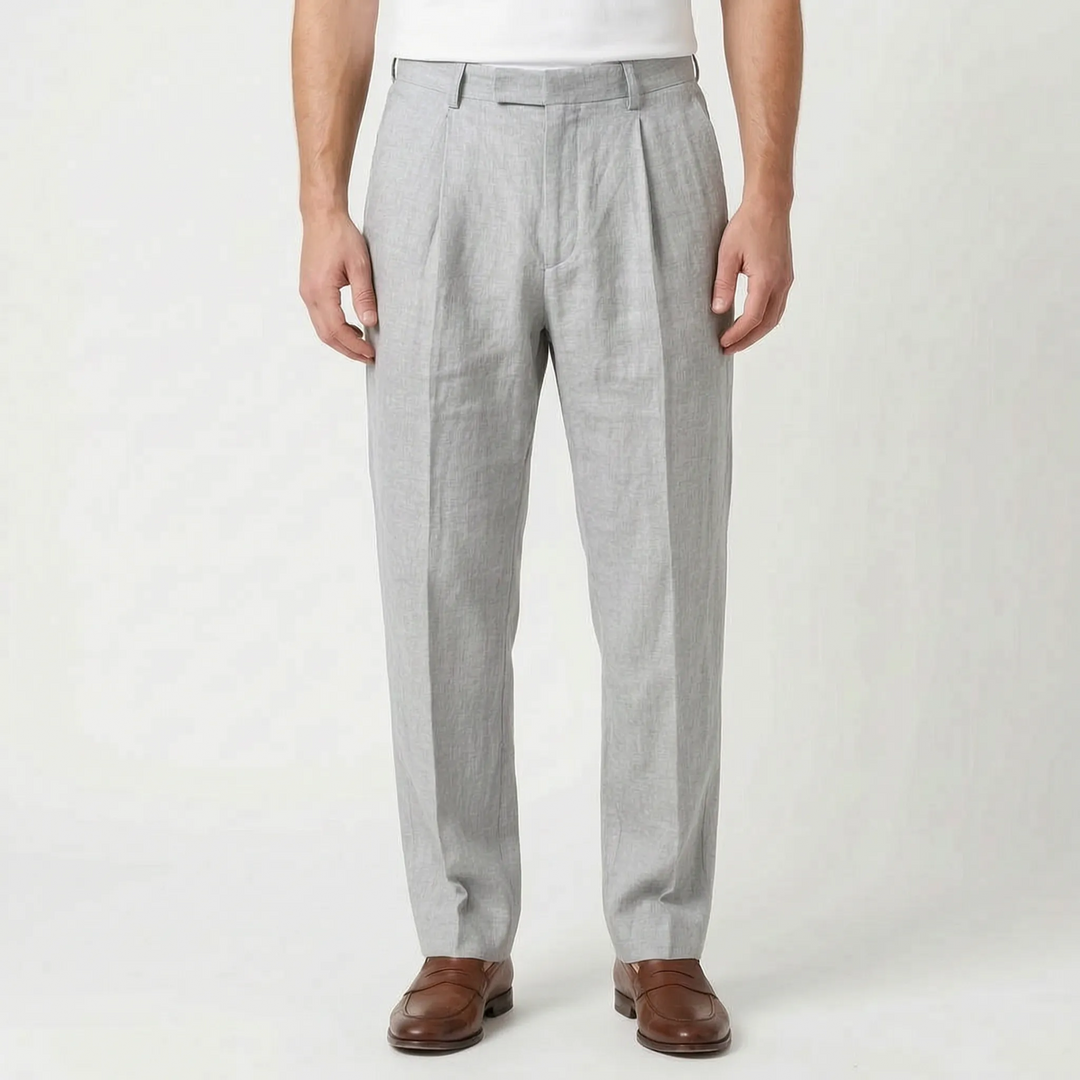 Ankle-length men's pleated trousers. Relaxed fit provides comfort for warm weather smart casual looks.