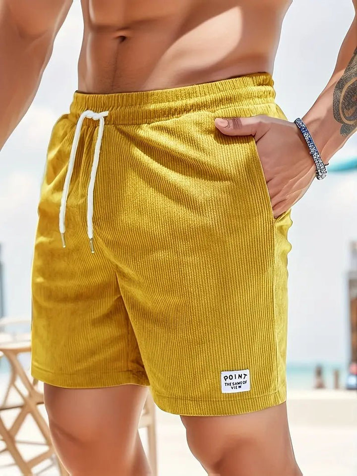 Solid color quick-dry swim trunks for men, essential summer beach and pool swimwear.