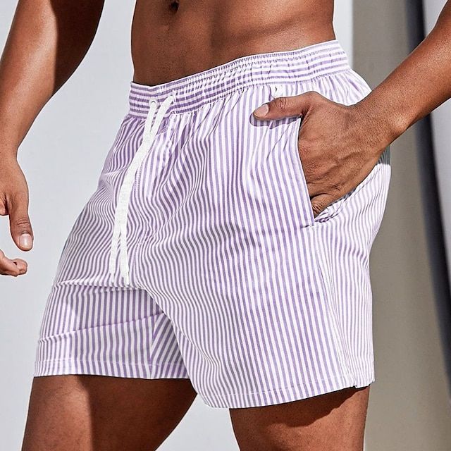 Textured view of men's quick-dry striped swim shorts, showcasing the fast-drying fabric for active summer use.