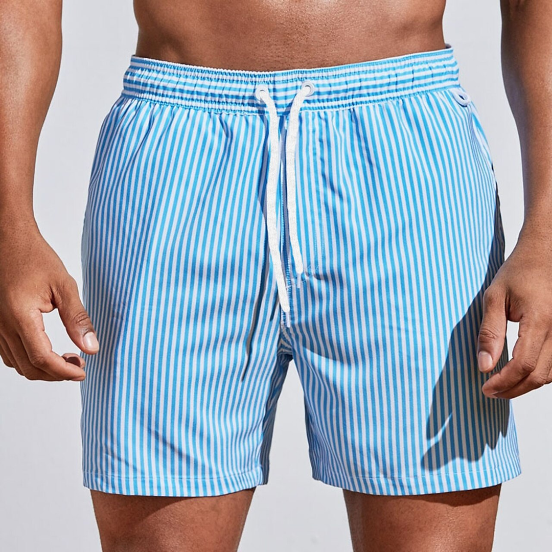 Quick-dry striped men's swim trunks, essential for summer beach days and poolside relaxation.