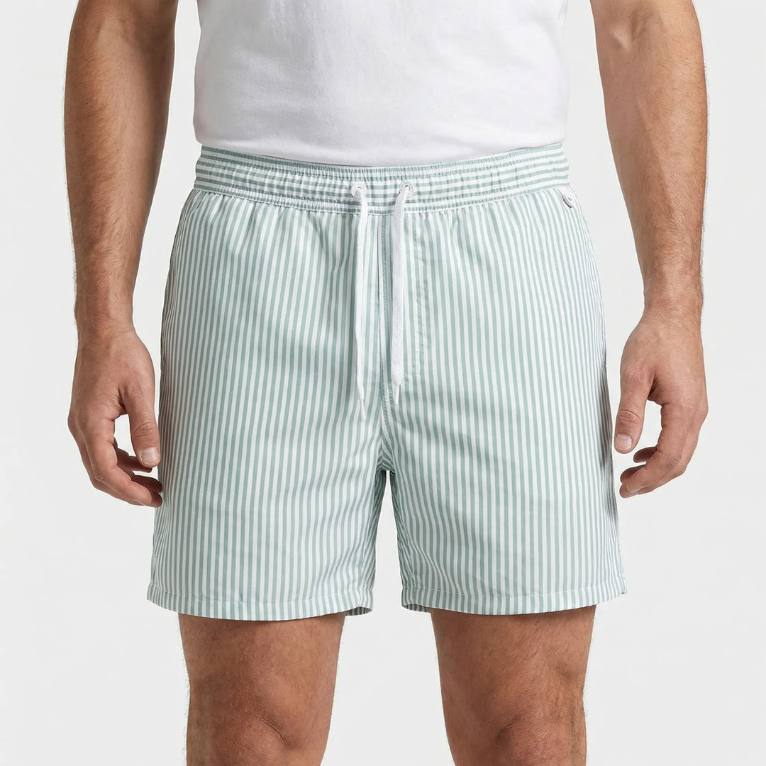 Modern men's striped swim trunks, quick-drying fabric for beach & pool.
