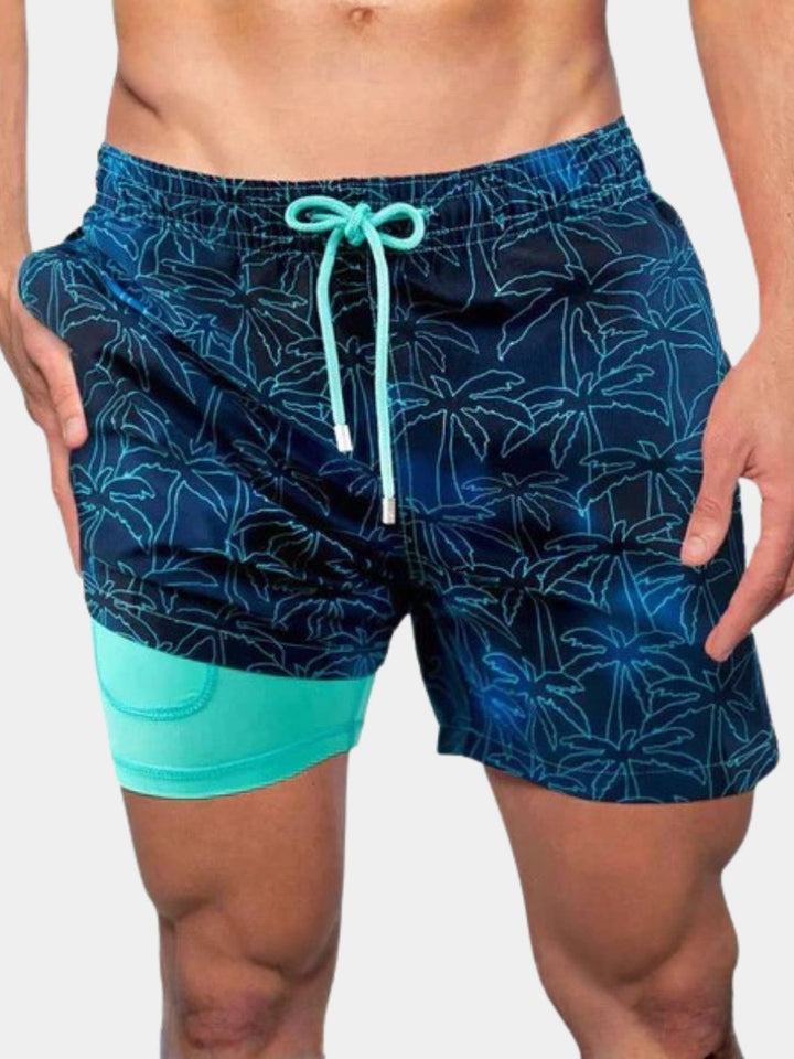 Men's quick-dry swim shorts with supportive compression liner, perfect for beach, pool, and summer activities.