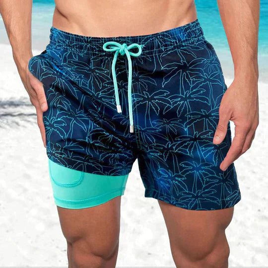 Stylish men's tropical print quick-dry swim shorts with compression liner, ideal for vacation & water sports.