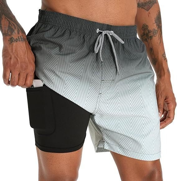 Textured quick-dry fabric of men's swimwear shorts, perfect for comfort during water sports & summer fun.