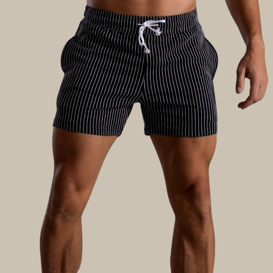 Athletic men's quick-dry swim shorts perfect for pool and beach leisure.