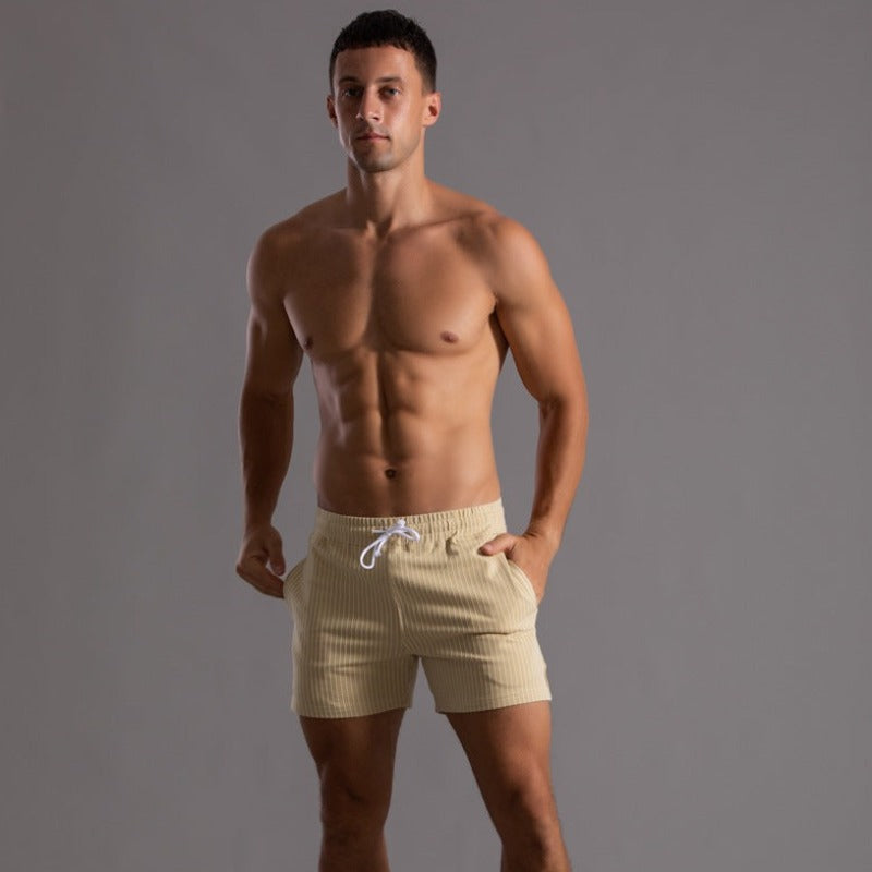 Vibrant men's quick-drying swim trunks, stylish for any summer adventure.