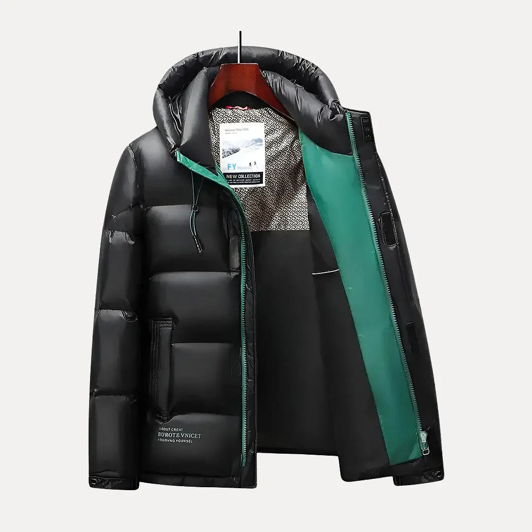 Durable men's quilted winter coat with a protective hood, designed for extreme cold & warmth.