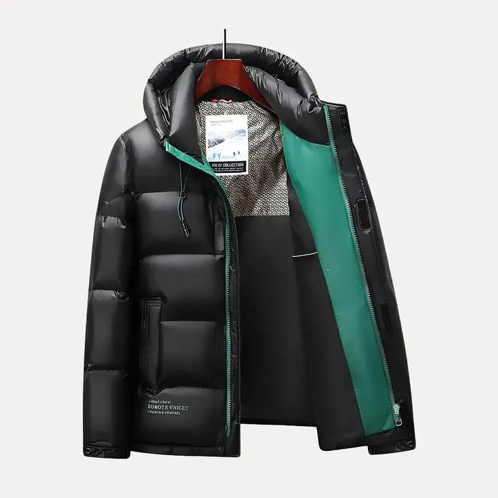 Durable men's quilted winter coat with a protective hood, designed for extreme cold & warmth.