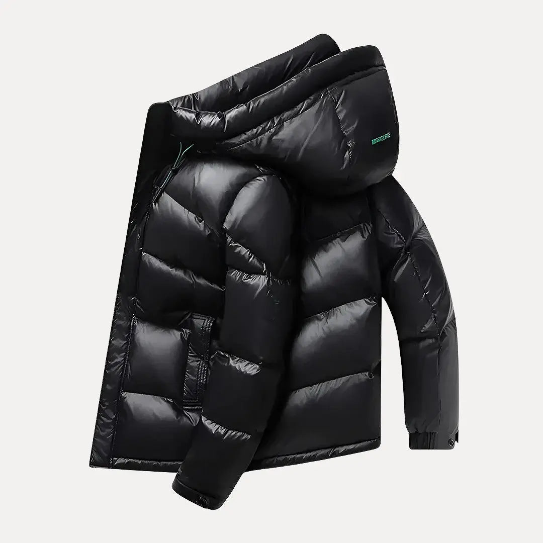 Comfortable men's insulated quilted jacket with hood, ideal winter outerwear for cold weather.